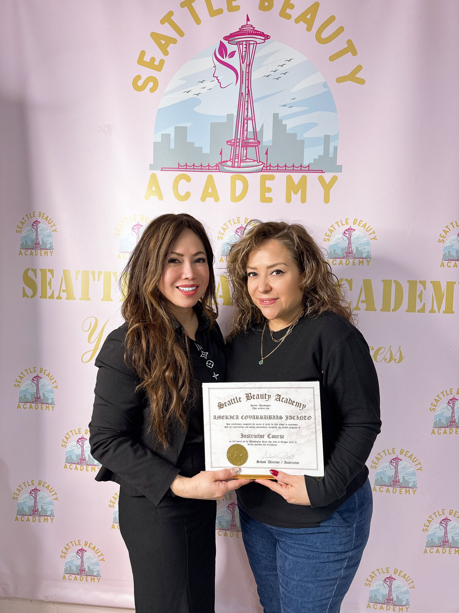 Instructors holding instructor course certificate at Seattle Beauty Academy in Seattle, Washington Instructors holding instructor course certificate at Seattle Beauty Academy in Seattle, Washington