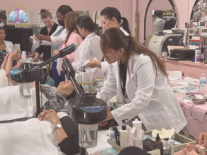 Esthetics student practicing advanced facial skincare techniques during hands-on training in Washington
