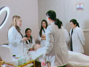 Students are listening the instructors teaching techniques in an esthetics program in Seattle Beauty Academy