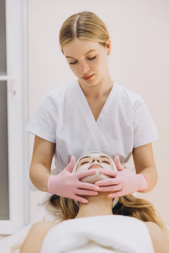 a student in hand on hand course at Seattle Beauty Academy is practicing on real model