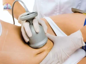 Hands-on body contouring certification training in Seattle — student practicing wrap technique at Seattle Beauty Academy