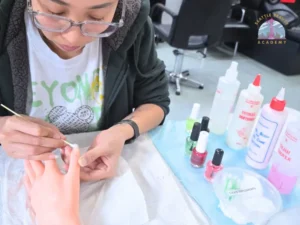 Washington nail technician student practicing nail techniques
