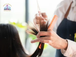 Hairstylist using professional scissors to create a layered haircut