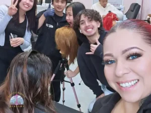 Students practicing hair and beauty services at a Washington beauty school
