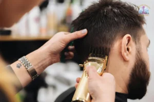 Barber student practicing low fade haircut at Seattle Beauty Academy